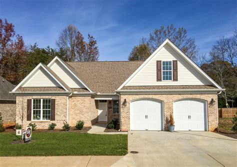 what color metal roof on tan house|tan brick house color schemes.